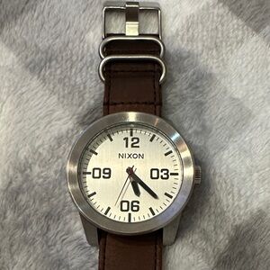 Nixon Silver Dial with Brown Strap Watch
